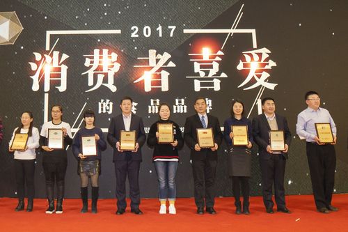 旺旺食品中国总部_旺旺集团市场营销长黄永松品牌之星奖杯_旺旺集团连续三年消费者最喜爱食品品牌